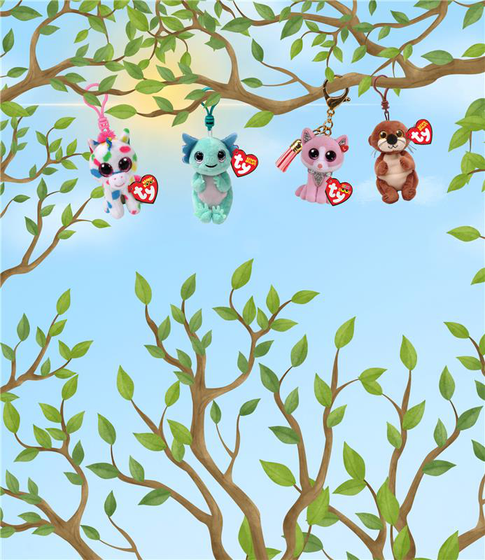 Four Beanie clips hanging from a tree